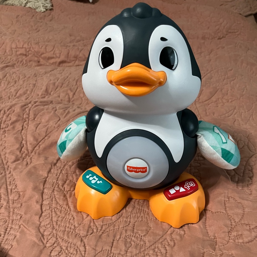 Fisher-Price Musical Penguin Toy - Black, White, Orange linkimals